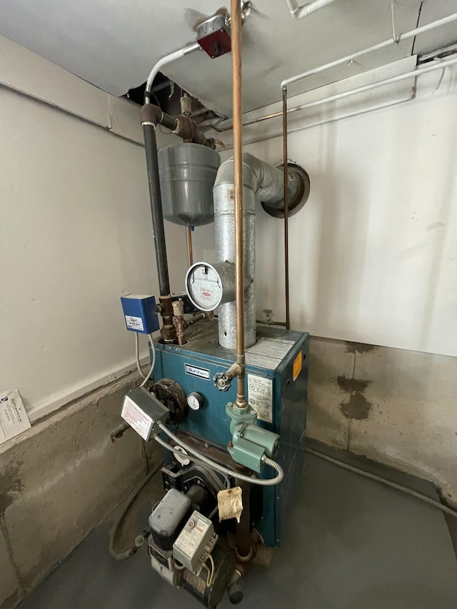 6 Alder Rd, Naples, ME 04055 - utility room featuring a heating unit