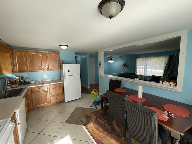 6 Alder Rd, Naples, ME 04055 - kitchen featuring freestanding refrigerator, a sink, light tile patterned floors, light countertops, and a ceiling fan