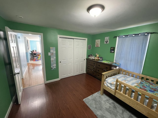 6 Alder Rd, Naples, ME 04055 - bedroom with wood finished floors, baseboards, and a closet