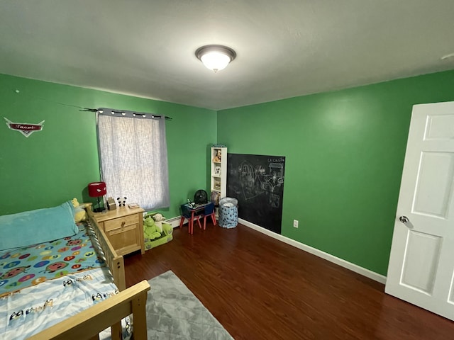 6 Alder Rd, Naples, ME 04055 - bedroom featuring wood finished floors, baseboards, and a baseboard radiator