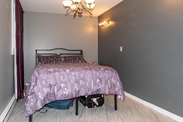bedroom featuring baseboards, a chandelier, and a baseboard radiator