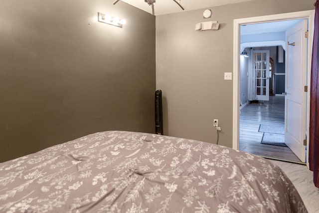 bedroom featuring wood finished floors