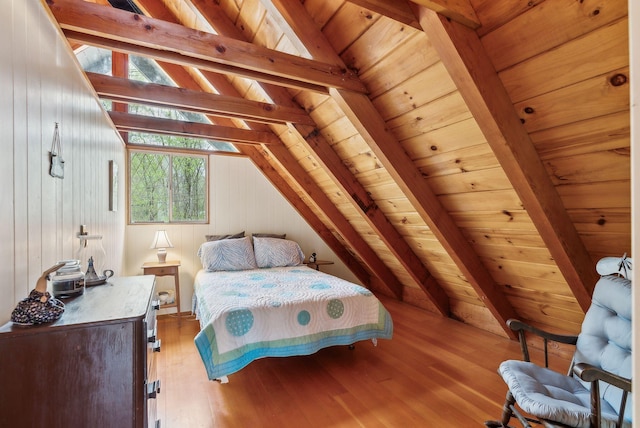 bedroom with wooden ceiling, wood-type flooring, and lofted ceiling with beams