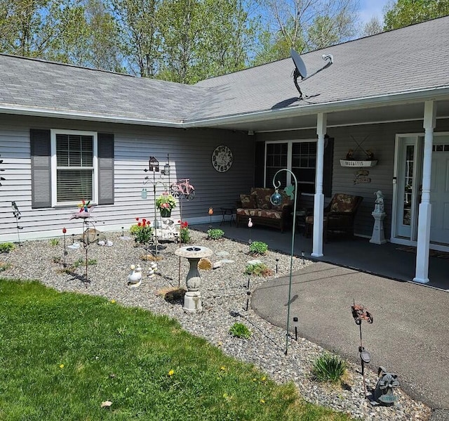 277 Grant Rd, Saint Albans, ME 04971 - entrance to property featuring a patio and roof with shingles