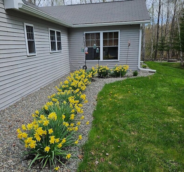 277 Grant Rd, Saint Albans, ME 04971 - exterior space featuring a shingled roof and a lawn