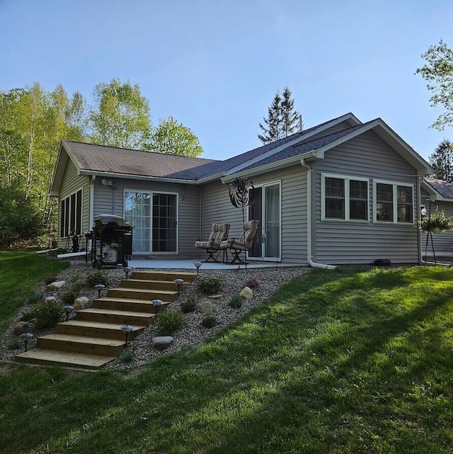 277 Grant Rd, Saint Albans, ME 04971 - rear view of house with a yard