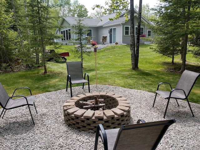 277 Grant Rd, Saint Albans, ME 04971 - view of patio with a fire pit