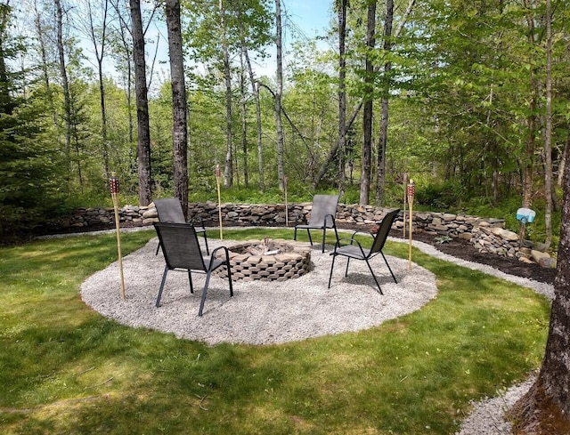 277 Grant Rd, Saint Albans, ME 04971 - view of patio / terrace featuring a fire pit