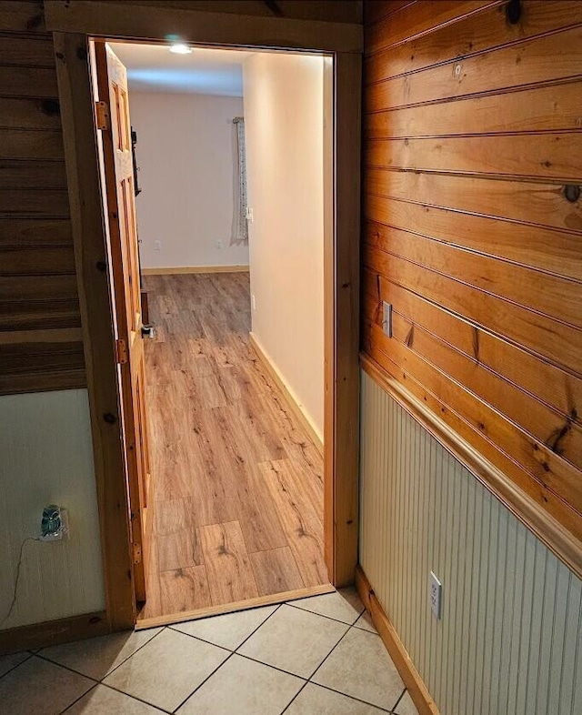 277 Grant Rd, Saint Albans, ME 04971 - corridor featuring light wood-style flooring, baseboards, and wooden walls
