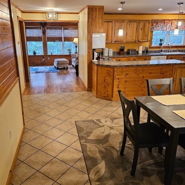 277 Grant Rd, Saint Albans, ME 04971 - kitchen featuring plenty of natural light, brown cabinetry, and dark countertops