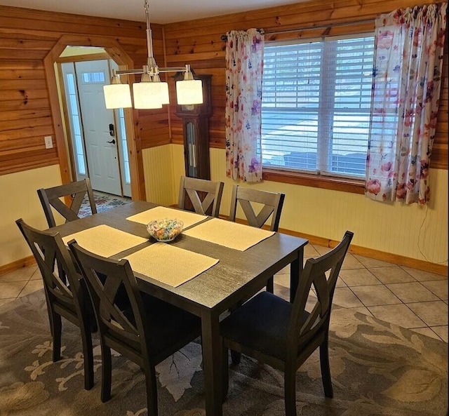 277 Grant Rd, Saint Albans, ME 04971 - tiled dining area featuring a wealth of natural light, wooden walls, and baseboards
