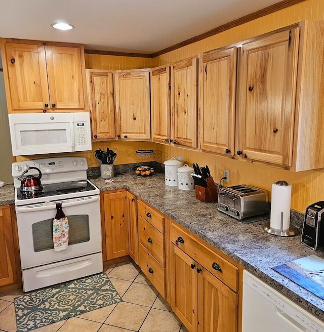 277 Grant Rd, Saint Albans, ME 04971 - kitchen featuring dark stone counters, light tile patterned floors, white appliances, recessed lighting, and a toaster