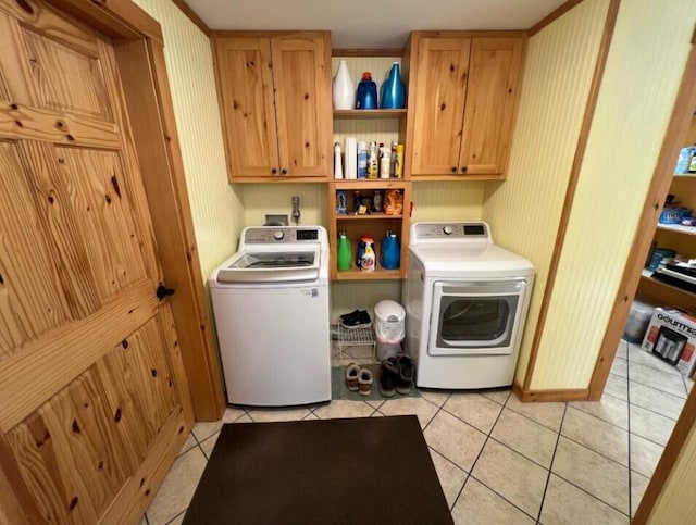 277 Grant Rd, Saint Albans, ME 04971 - clothes washing area with cabinet space, light tile patterned floors, and wallpapered walls
