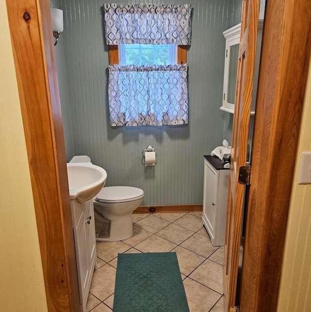 277 Grant Rd, Saint Albans, ME 04971 - half bathroom with tile patterned flooring, toilet, vanity, and baseboards