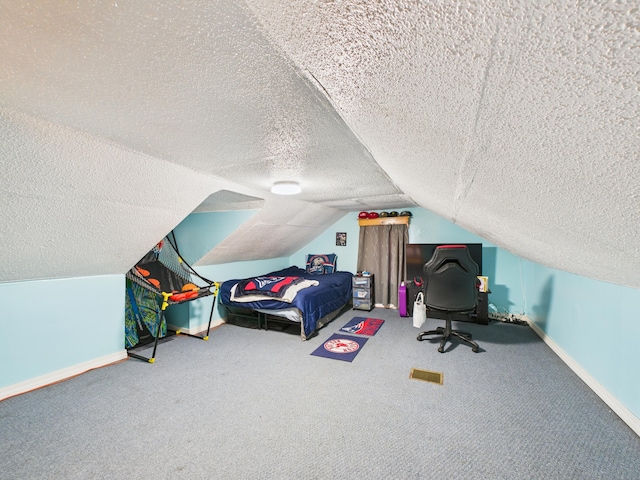 45 Crosby Ave, Caribou, ME 04736 - carpeted bedroom featuring baseboards, vaulted ceiling, and a textured ceiling