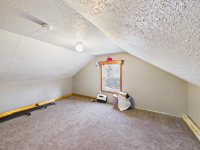 45 Crosby Ave, Caribou, ME 04736 - bonus room featuring a textured ceiling, baseboards, lofted ceiling, and carpet floors