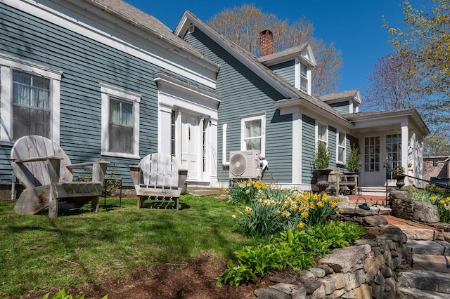 155 Pepperrell Rd, Kittery, ME 03905 - back of house featuring a lawn, ac unit, and a chimney