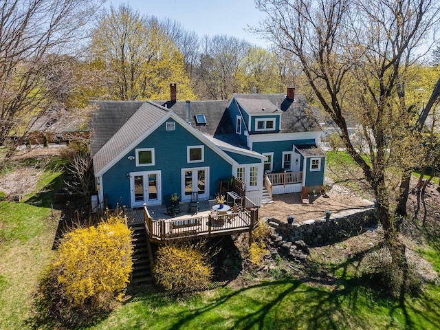 155 Pepperrell Rd, Kittery, ME 03905 - back of house featuring stairs, a wooden deck, french doors, and a chimney
