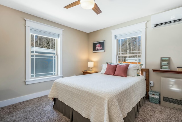 bedroom featuring carpet flooring, heating unit, a wall mounted AC, and multiple windows