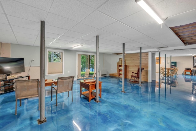 basement featuring a drop ceiling
