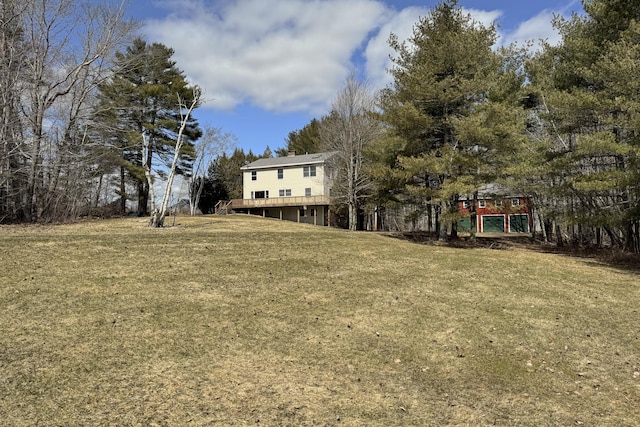view of yard featuring a wooden deck