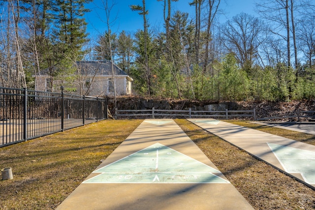 1 Old County Rd Unit 140, Wells, ME 04090 - surrounding community featuring shuffleboard, fence, and a lawn