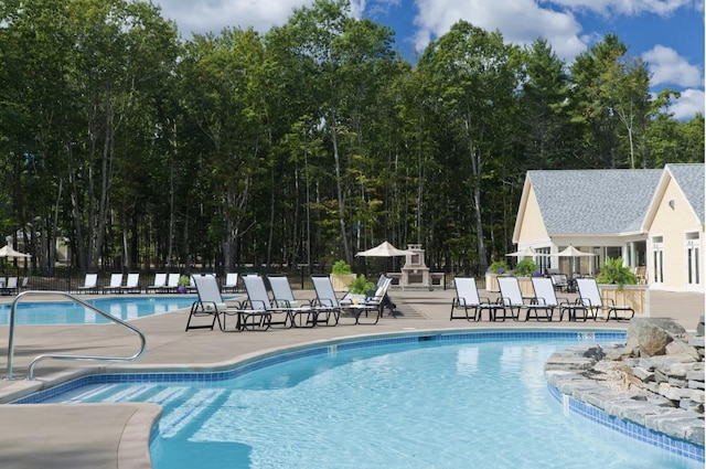 1 Old County Rd Unit 140, Wells, ME 04090 - community pool with an outbuilding, fence, and a patio area
