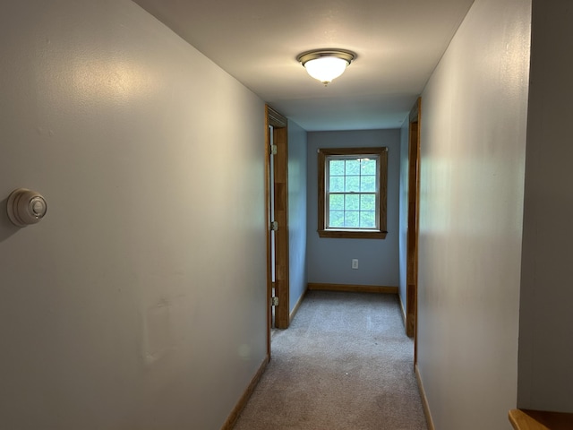 142 Abbott Rd, Albion, ME 04910 - hallway featuring light colored carpet and baseboards