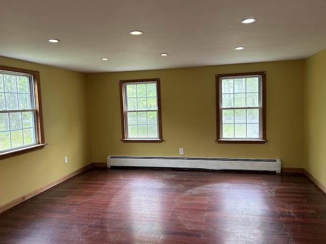 142 Abbott Rd, Albion, ME 04910 - spare room with baseboard heating, healthy amount of natural light, recessed lighting, dark wood finished floors, and baseboards