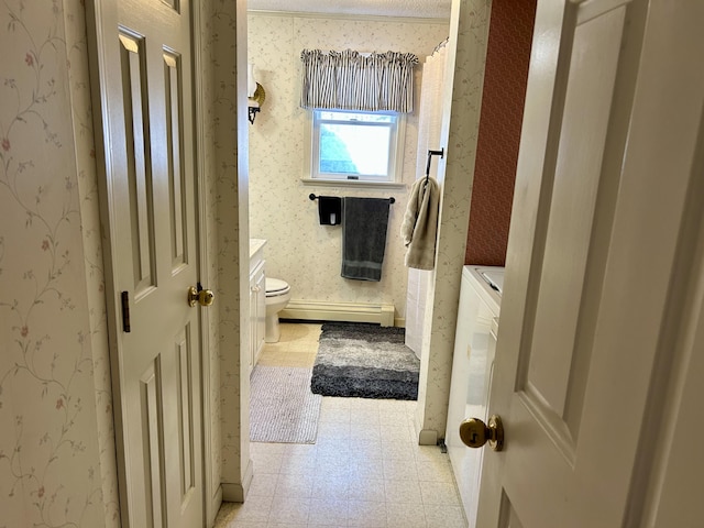 838 Cross Town Rd, Embden, ME 04958 - bathroom featuring a baseboard radiator, wallpapered walls, toilet, and tile patterned floors
