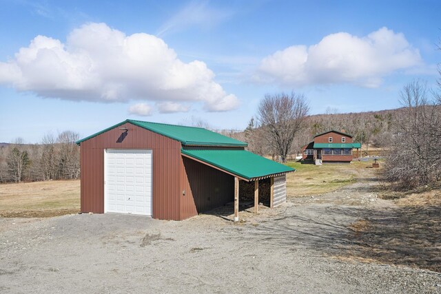 77 Huffs Corner Rd, Wellington, ME 04942 - view of outdoor structure with an outdoor structure and gravel driveway