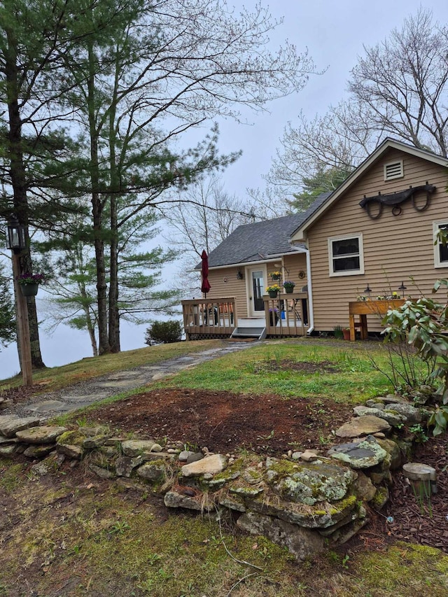186 Hawes Ln, Union, ME 04862 - rear view of house featuring a deck and roof with shingles