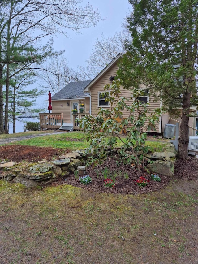186 Hawes Ln, Union, ME 04862 - rear view of property with a deck and roof with shingles