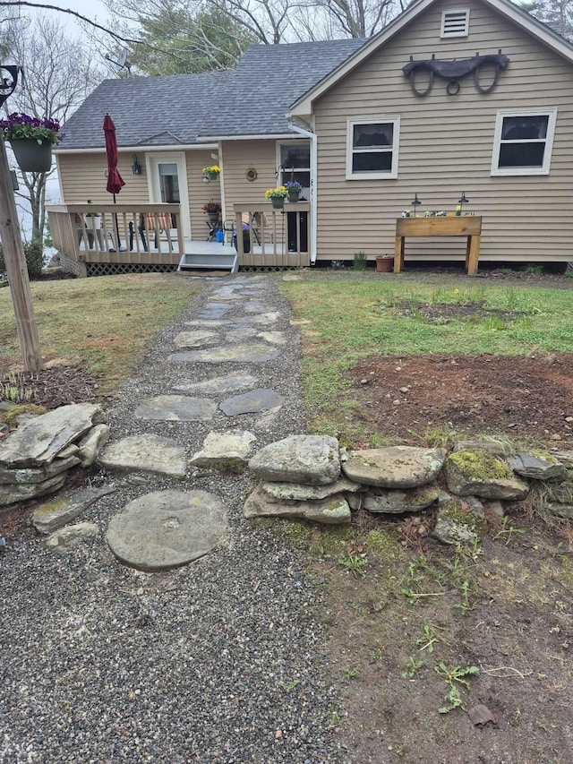 186 Hawes Ln, Union, ME 04862 - view of front of property featuring a deck and a shingled roof