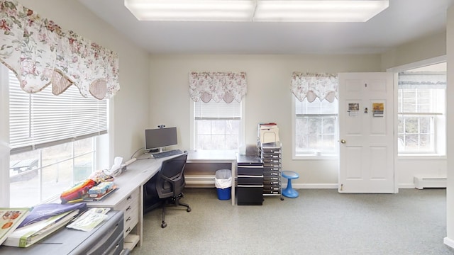 office with baseboard heating, baseboards, and a baseboard radiator