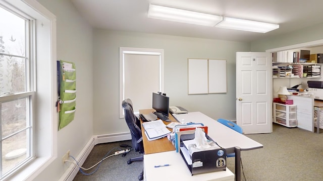 home office with baseboards and carpet floors
