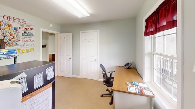 office area with baseboards and carpet