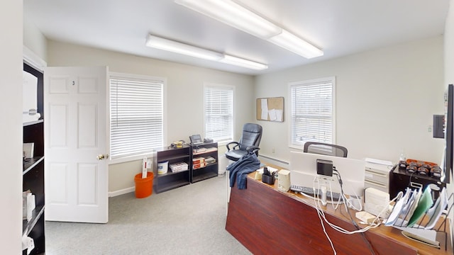 home office with baseboards and carpet flooring