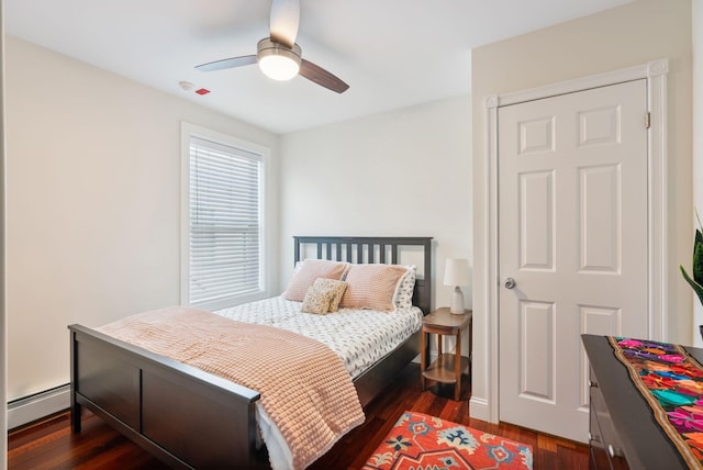 125 Morning St Unit 3/6, Portland, ME 04101 - bedroom with dark wood-type flooring, a baseboard radiator, and a ceiling fan