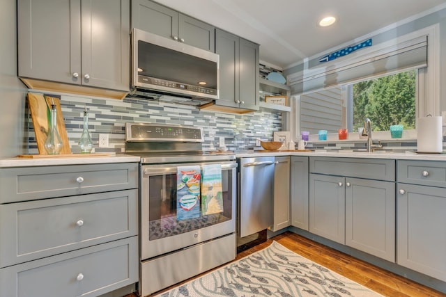 369 Main St Unit 3, Ogunquit, ME 03907 - kitchen featuring a sink, appliances with stainless steel finishes, gray cabinets, and light countertops