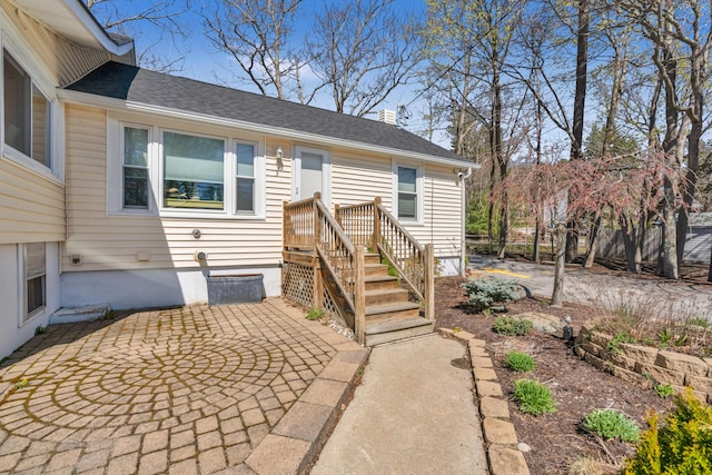 369 Main St Unit 3, Ogunquit, ME 03907 - view of front of property featuring a patio and a shingled roof