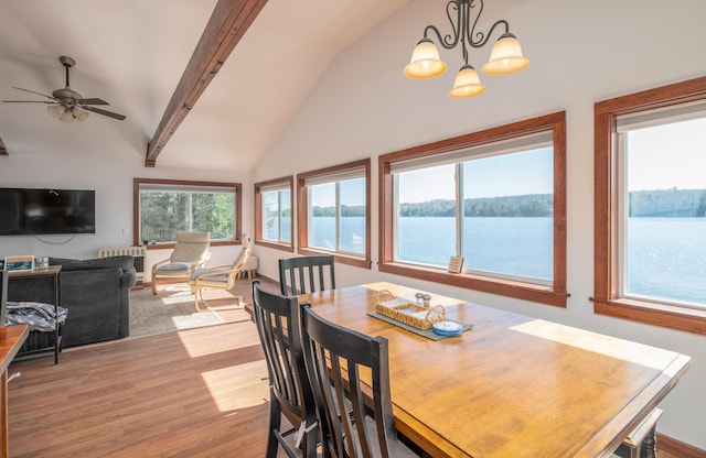 4 Tabert Ln, Belgrade, ME 04917 - dining room featuring light wood-type flooring, a chandelier, a water view, and ceiling fan