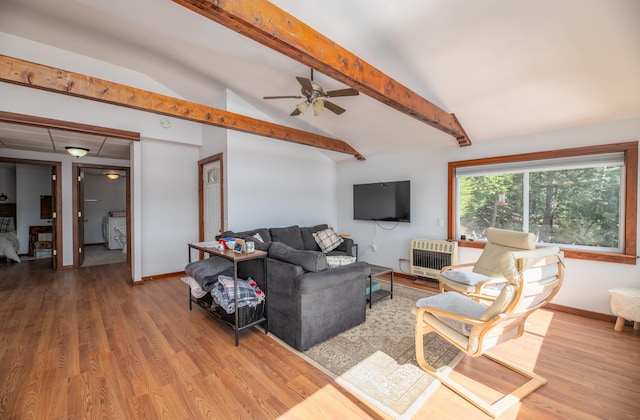 4 Tabert Ln, Belgrade, ME 04917 - living room with heating unit, a ceiling fan, wood finished floors, washer / clothes dryer, and baseboards
