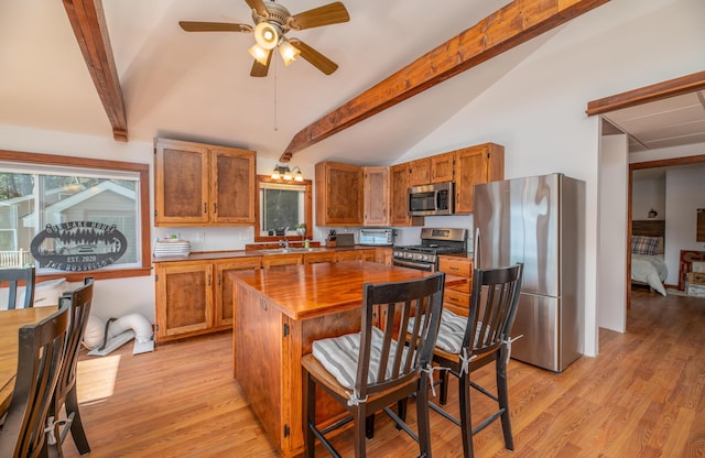 4 Tabert Ln, Belgrade, ME 04917 - kitchen with appliances with stainless steel finishes, ceiling fan, brown cabinets, and a sink