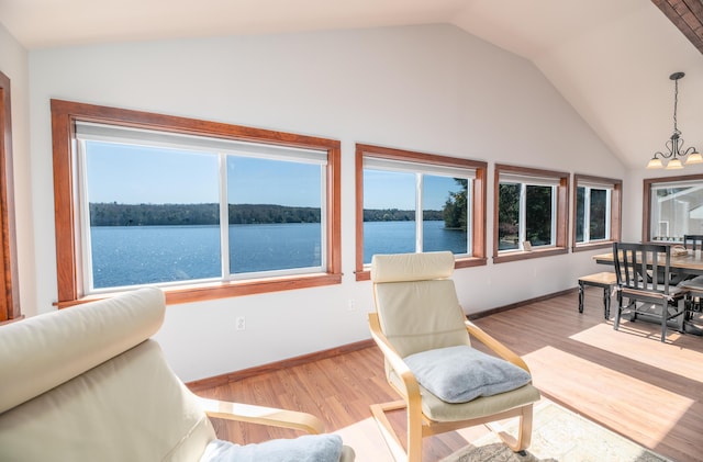 4 Tabert Ln, Belgrade, ME 04917 - sunroom / solarium featuring vaulted ceiling and a water view