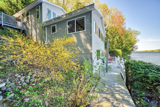 4 Tabert Ln, Belgrade, ME 04917 - view of side of property with a deck with water view