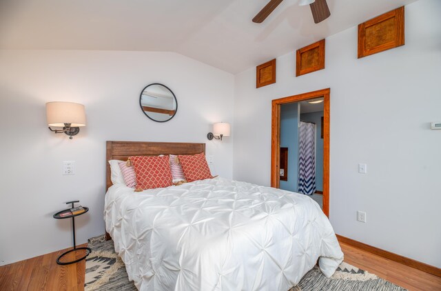 4 Tabert Ln, Belgrade, ME 04917 - bedroom featuring vaulted ceiling, wood finished floors, and a ceiling fan