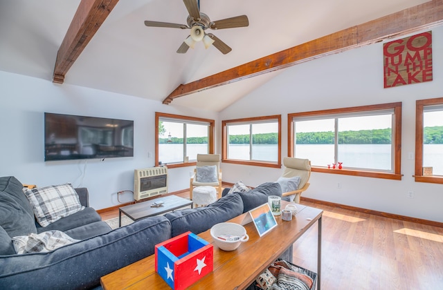 4 Tabert Ln, Belgrade, ME 04917 - living room featuring heating unit, wood finished floors, ceiling fan, and a water view