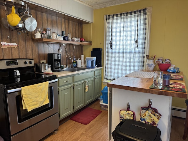 6 Spring St, Waterville, ME 04901 - kitchen with electric stove, a sink, green cabinetry, open shelves, and light wood-style flooring
