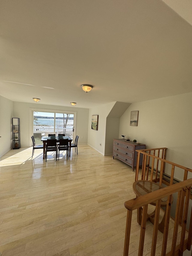 dining area with light wood-type flooring